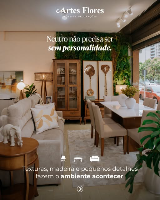 Sala de estar decorada com sofá e mesa de jantar Artes Flores